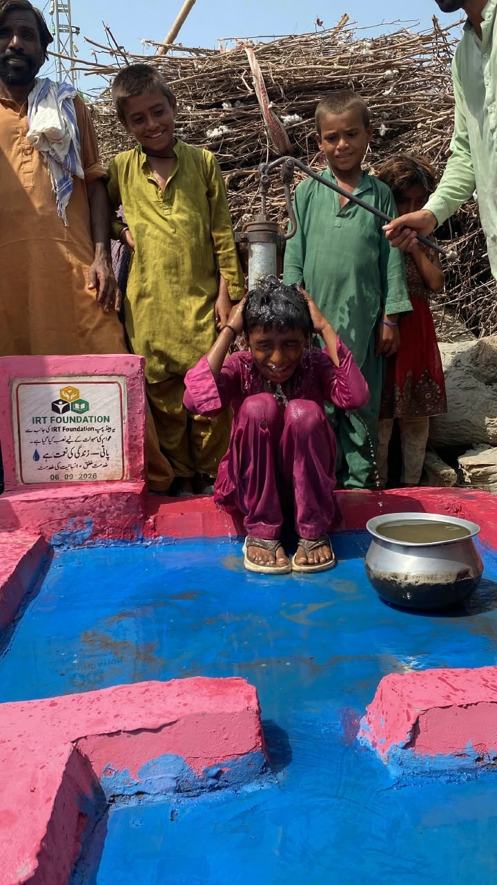 Sadaqah jariyah water well hand pump installed by IRT Welfare Foundation in a village in Pakistan